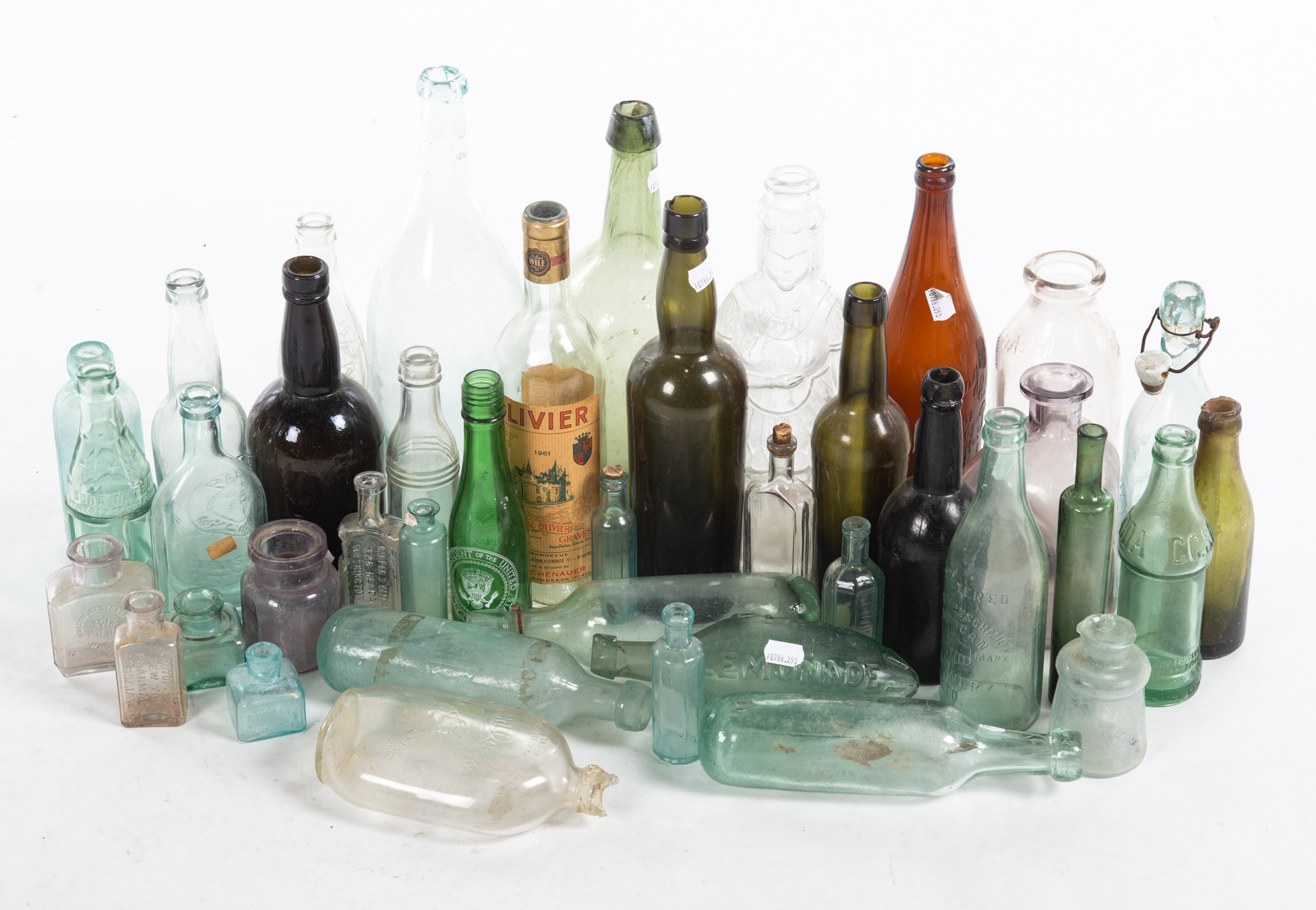 ASSORTMENT OF EARLY GLASS BOTTLES