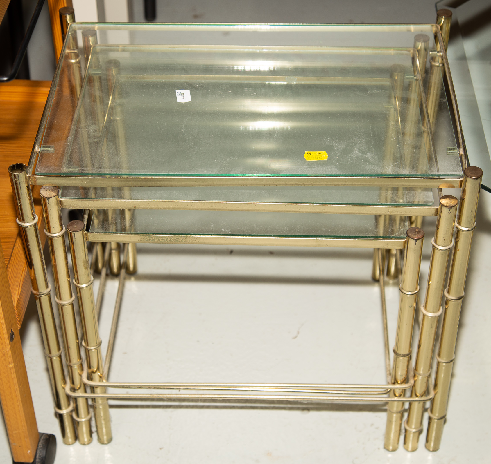 ASSORTMENT OF TABLES Includes brass