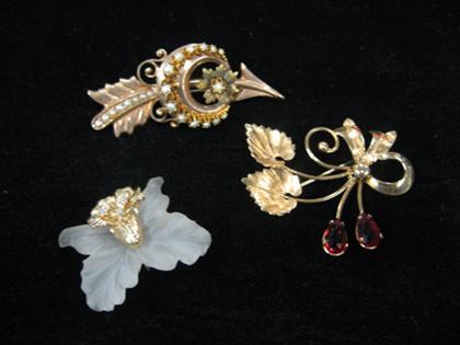 Assortment of three gold pins   