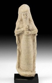 ASSYRIAN POTTERY FIGURE - STAN