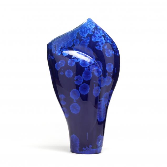 ASYMMETRICAL CRYSTALLINE CERAMIC