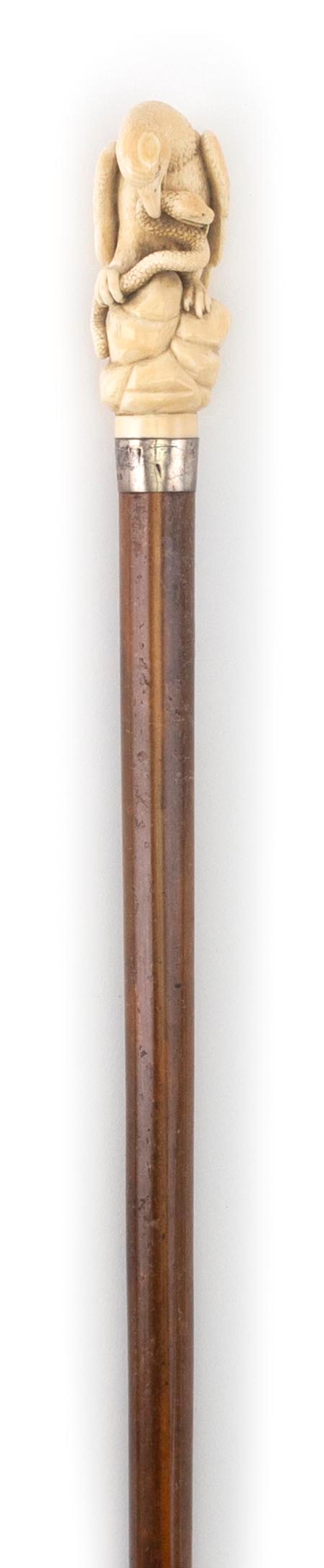 ATTACKING EAGLE CANE LATE