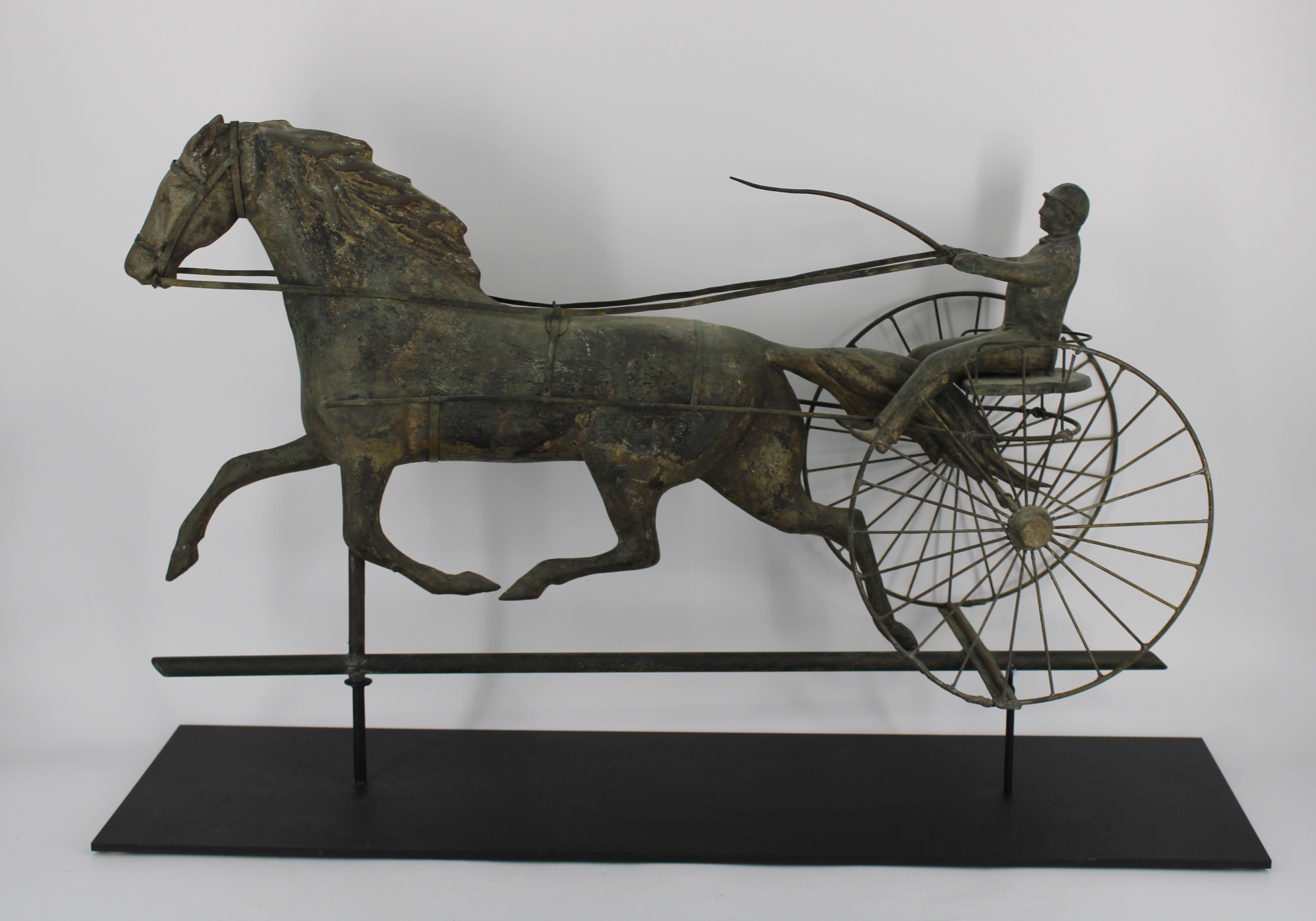 ATTR. J. W. FISKE HORSE AND SULKY