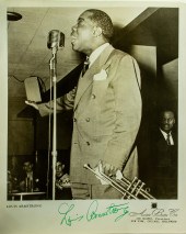 AUTOGRAPHED PHOTOGRAPH OF LOUI