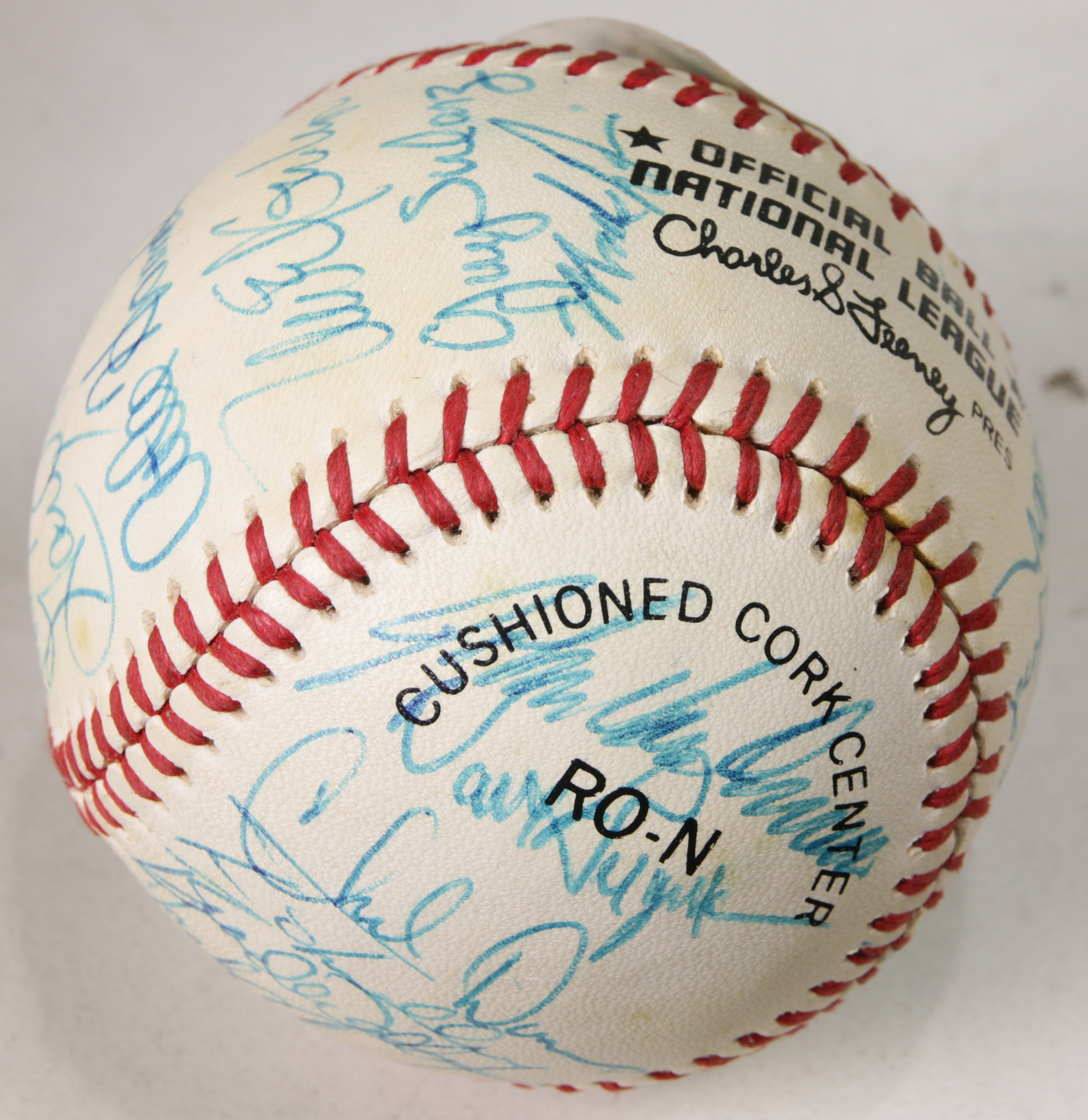 AUTOGRAPHED SIGNED BASEBALL ON A