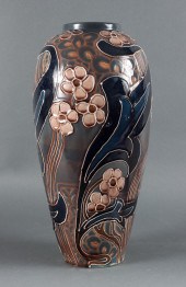 Avon/Wheeling slip glazed pott