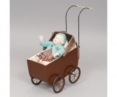 Baby "Doe" in a brown pram, wi