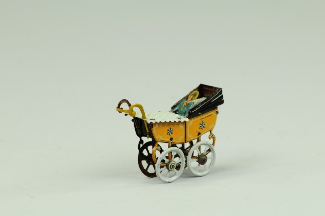 BABY IN CARRIAGE PENNY TOY