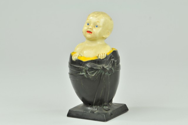 BABY IN EGG MECHANICAL BANK