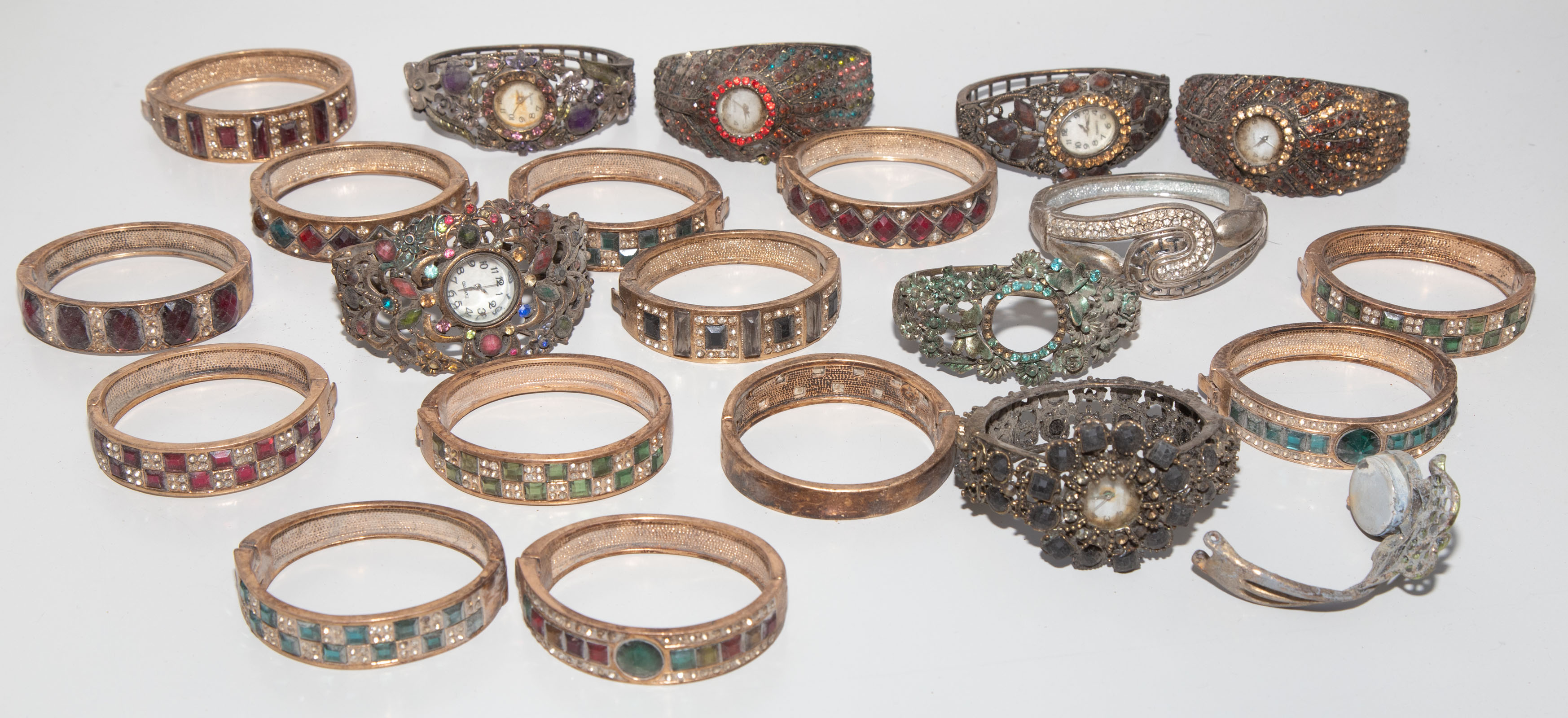 BAG OF COSTUME BANGLES .
