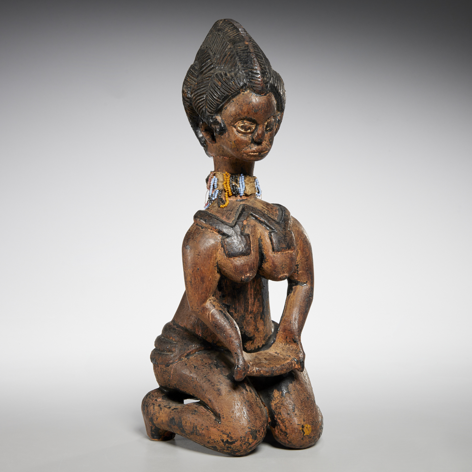 BAGA PEOPLES, KNEELING FEMALE