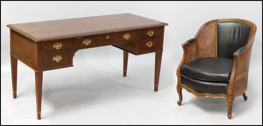 BAKER CARVED MAHOGANY DESK.