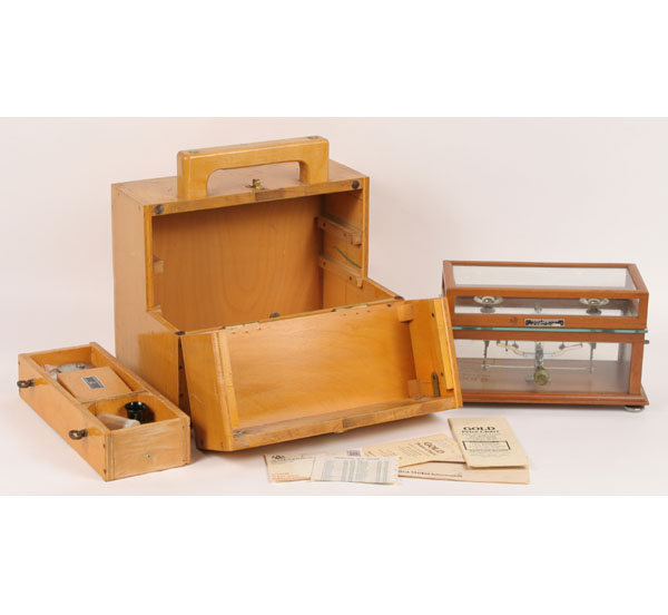 Balance scales in wood carrying