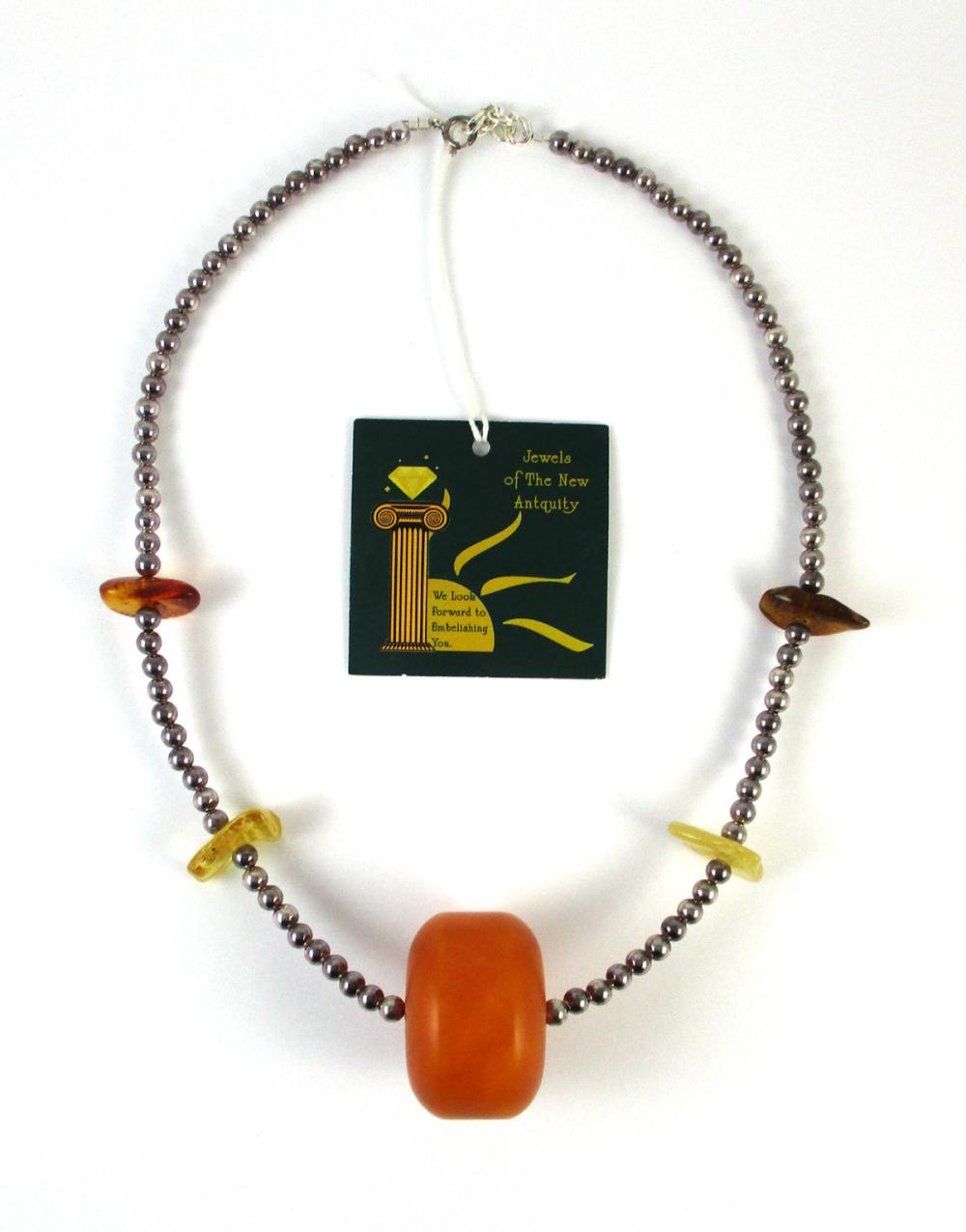 BALTIC AMBER AND FINE SILVER BEAD