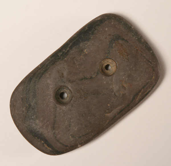 Banded slate gorget.  Found on