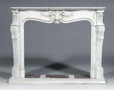 Baroque style marble fire surround,