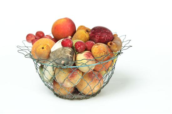 BASKET OF STONE FRUIT.  American