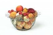 BASKET OF STONE FRUIT.  Americ