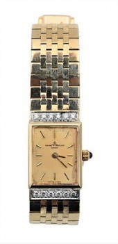 BAUME AND MERCIER 14 KARAT YEL