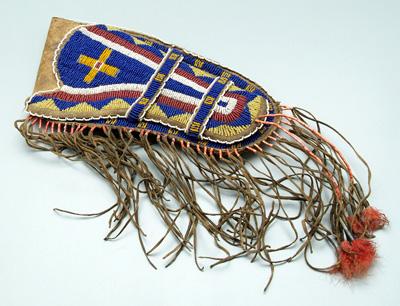 Beaded leather holster, sinew sewn,