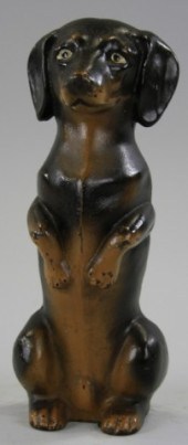 BEGGING DACHSHUND DOORSTOP Cas