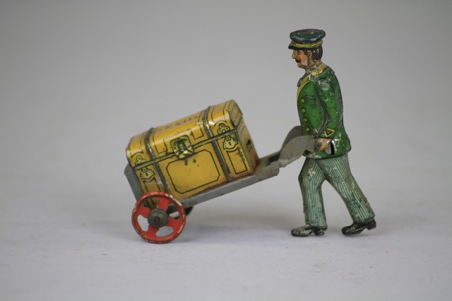 BELL HOP WITH LUGGAGE PENNY TOY