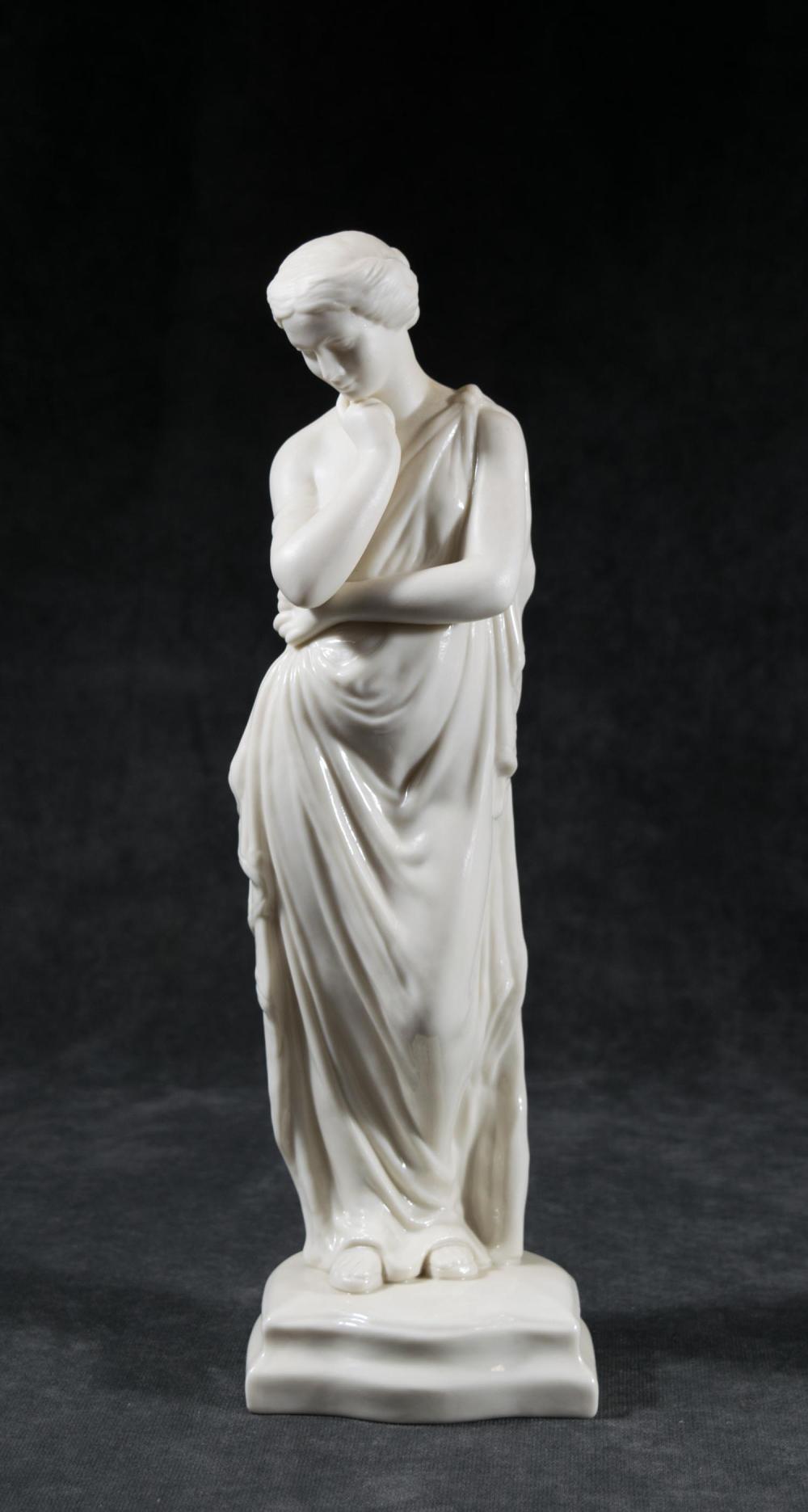 BELLEEK PORCELAIN FIGURE OF