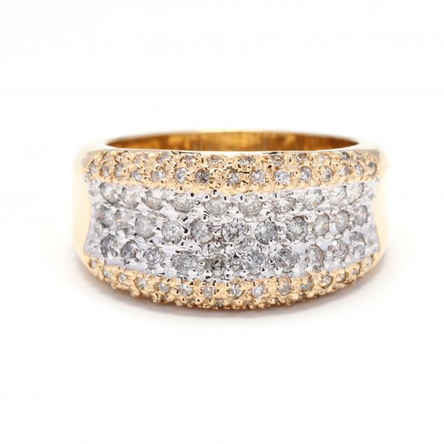 BI-COLOR GOLD AND DIAMOND RING In a