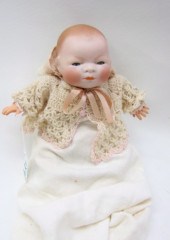 BISQUE HEAD BABY DOLL in the m
