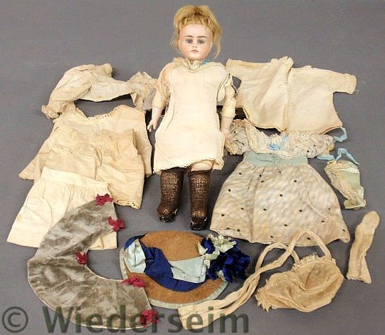 Bisque head doll 19th c. with a