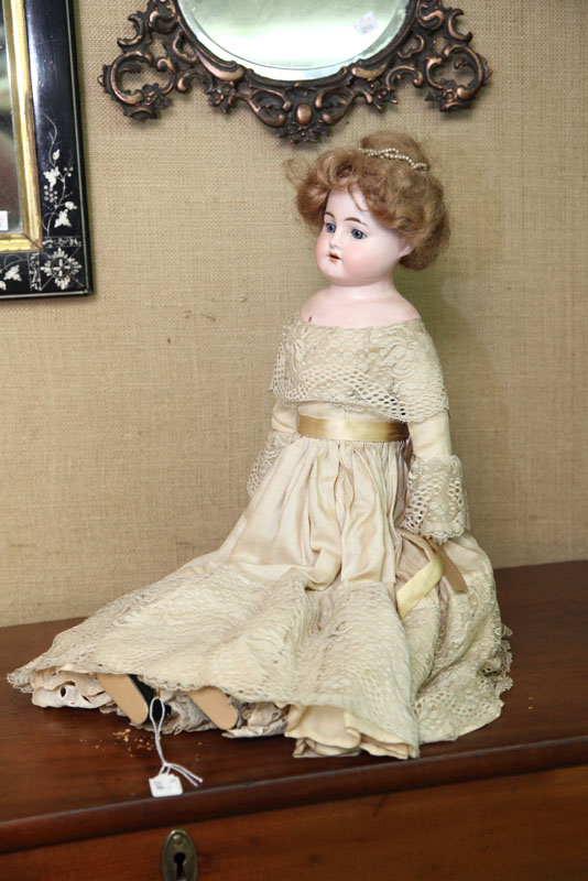 BISQUE HEAD DOLL. A Heinrich