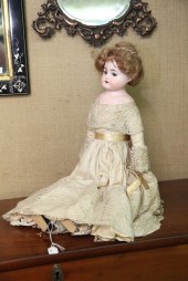 BISQUE HEAD DOLL. A Heinrich H
