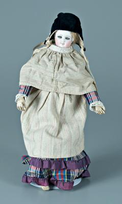 Bisque head doll, carved wooden