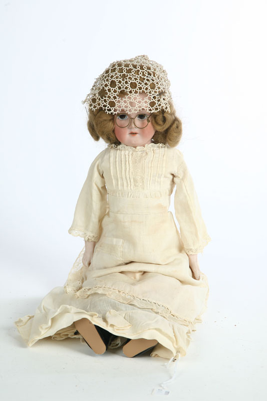 BISQUE HEAD DOLL. The doll is