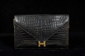 Black alligator Hermes clutch