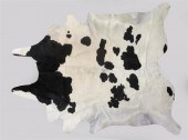 BLACK AND WHITE COW HIDE RUG,