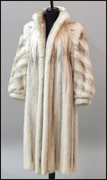 BLACK AND WHITE CROSS MINK COAT.