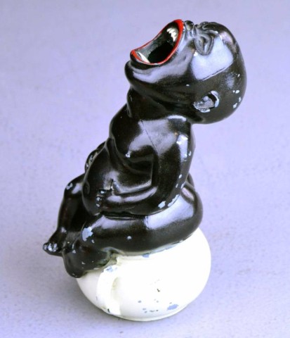 BLACK BABY FIGURE METAL