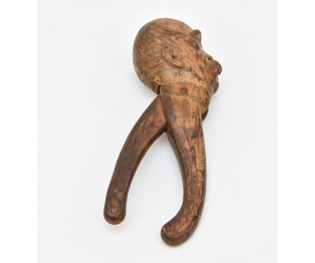 Black Forest head carved nut