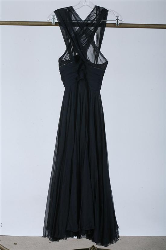 BLACK HALTER GOWN. Beaded straps
