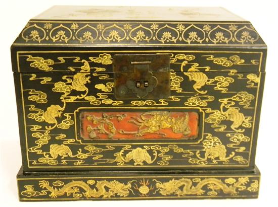 Black lacquered lift top chest 