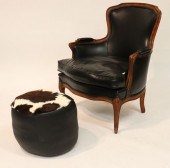 BLACK LEATHER BERGERE AND A PO