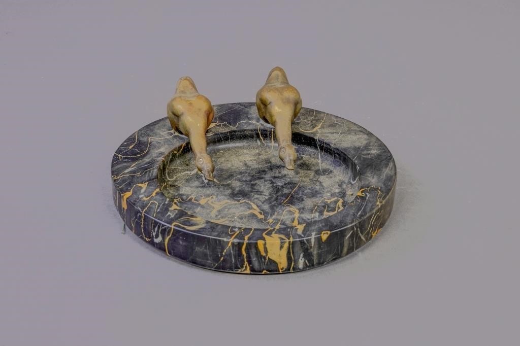 Black marble ashtray, circa 1920,