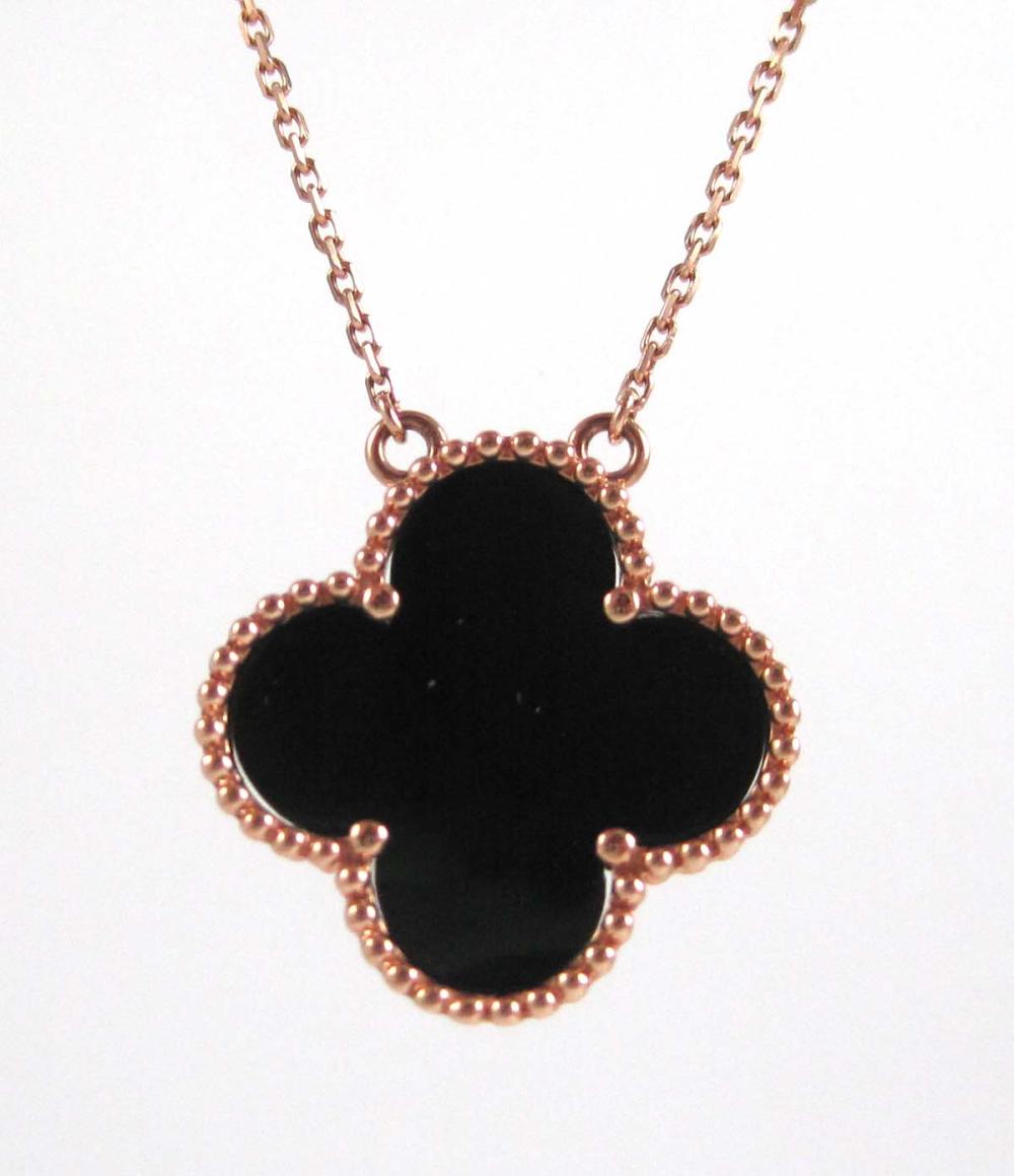 BLACK ONYX AND FOURTEEN KARAT