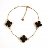 BLACK ONYX AND FOURTEEN KARAT