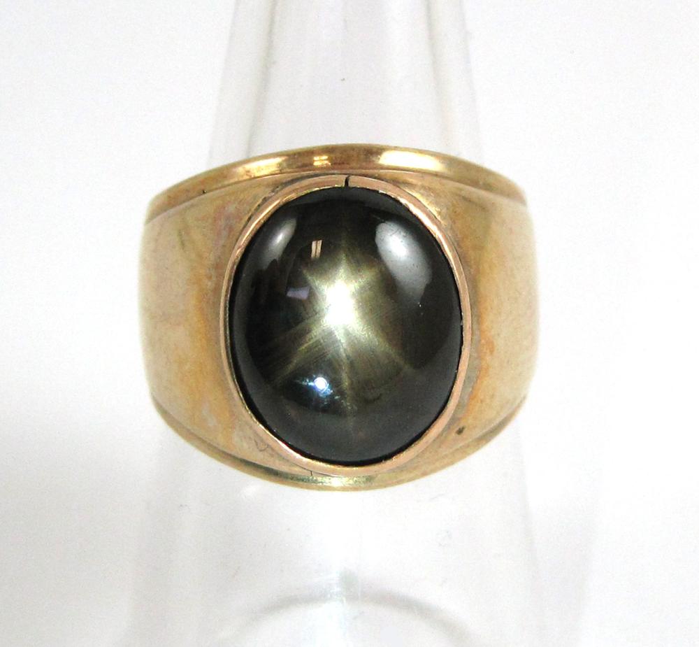 BLACK STAR SAPPHIRE AND YELLOW GOLD