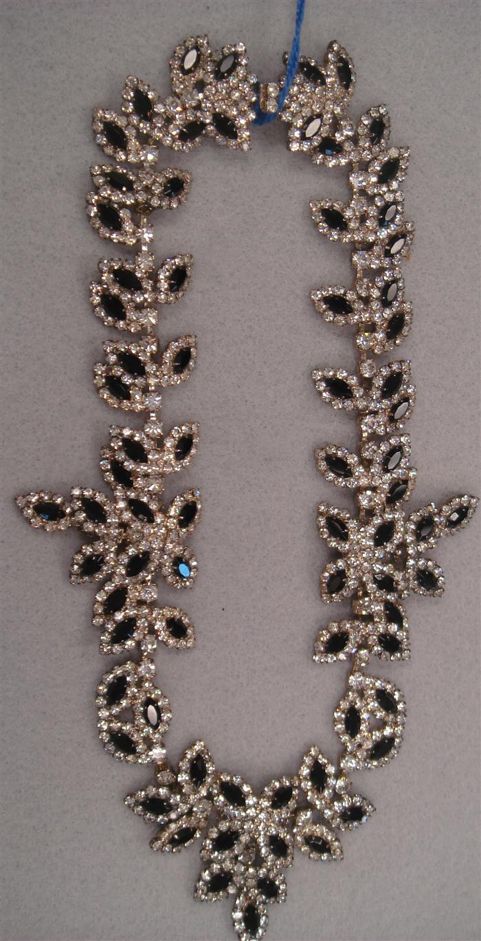 Black stones and rhinestone bib