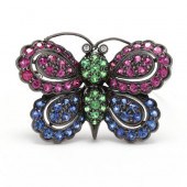 BLACKENED GOLD AND GEM-SET BUT