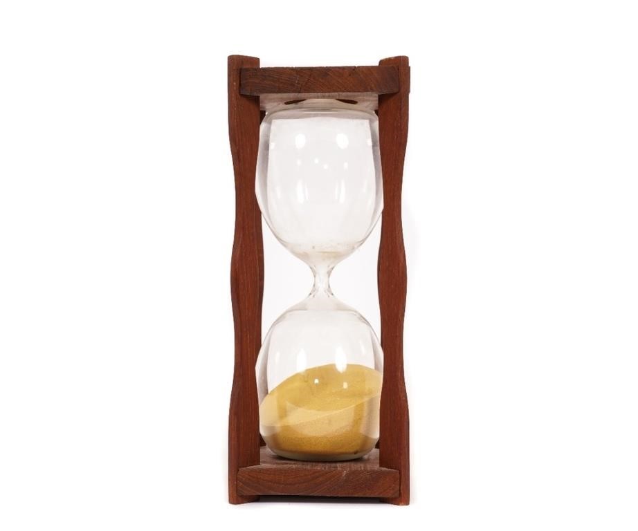 Blown glass hour glass in a
