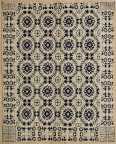Blue and white jacquard coverl